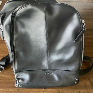 Black leather backpack purse. Used once.